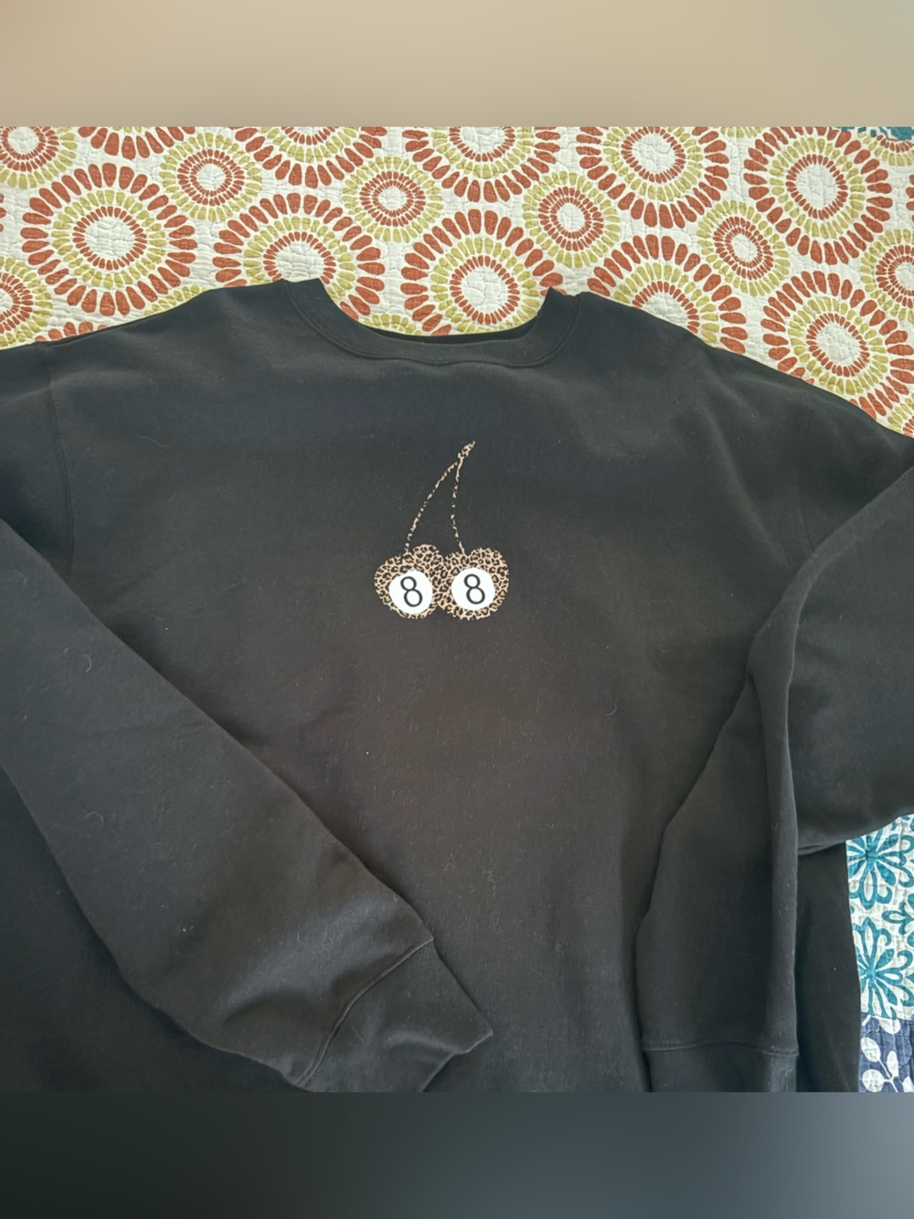 Black Crewneck Sweater with Cherry Graphic